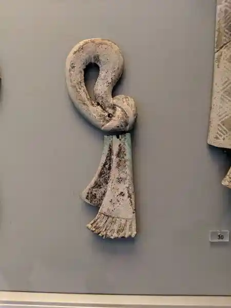 Sacred knots, a religious symbol of Minoan Crete, made of faience with linear decoration